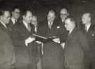 Senior staff dinner, (Lee of Sheffield Ltd.) Arthur Lee and Sons Ltd., steel manufacturers at the Grand Hotel, Leopold Street showing presentation to (4th left) Mr. G. Wilton Lee Senior staff dinner, (Lee of Sheffield Ltd.) Arthur Lee and Sons Ltd., steel manufacturers at the Grand Hotel, Leopold Street showing presentation to (4th left) Mr. G. Wilton Lee