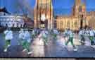 Sheffield City Morris at their traditional dance outside Sheffield Cathedral, Church Street on New Year's Day, 2024