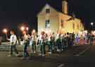 Sheffield City Morris. Torchlight procession at the end of the Sidmouth Folk Festival, Devon