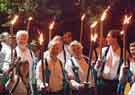 Sheffield City Morris. Torchlight procession at the end of the Sidmouth Folk Festival, Devon