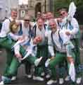 Sheffield City Morris. Team members posing in the centre of Warwick during the Warwick Folk Festival