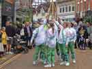 Sheffield City Morris. Women's team dancing in Central Warwick during the Warwick Folk Festival