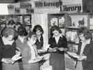 Display of books in a school organised by Hillsborough Branch Library