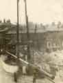 Construction of war memorial, Barker's Pool showing (top left) Manchester Hotel, Nos. 4- 6 Division Street and (right) W. B. Wolstenholme Ltd., ivory cutters, Nos. 64 - 66 Holly Street, [1925]