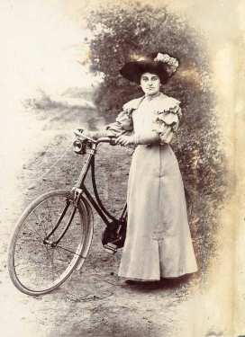 Unidentified woman with a bicycle