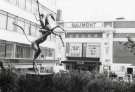 Horse and Rider sculpture by David Wynne, Fountain Precinct, Barkers Pool showing (centre) the Gaumont 2 Cinema and (left) New Oxford House offices, Barkers Pool