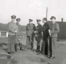 German prisoners of war and British military officers, probably Norton prisoner of war camp 174, Cuckney, near Mansfield, Nottinghamshire German prisoners of war and British military officers, probably Norton prisoner of war camp 174, Cuckney, near Mansfield, Nottinghamshire
