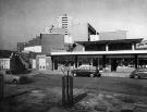 Shopping area at Pye Bank Close showing viewing platform above and (l.to r.) No. 24 Pheasey and Son, grocers and No. 22 J. T. Holland, butcher
