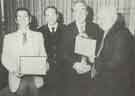 The chair of the South Yorkshire County Fire and Civil Defence Authority, Fire Service Committee, Councillor Rigby and the chief fire officer H.E. Wright present awards to Trevor Vigrass and Donald Hall The chair of the South Yorkshire County Fire and Civil Defence Authority, Fire Service Committee, Councillor Rigby and the chief fire officer H.E. Wright present awards to Trevor Vigrass and Donald Hall