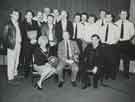 South Yorkshire County Fire Service: Penistone fire station staff with (sitting centre) Chief Fire Officer H. E. Wright with the National Fire Service Benevolent Fund awards for 1990